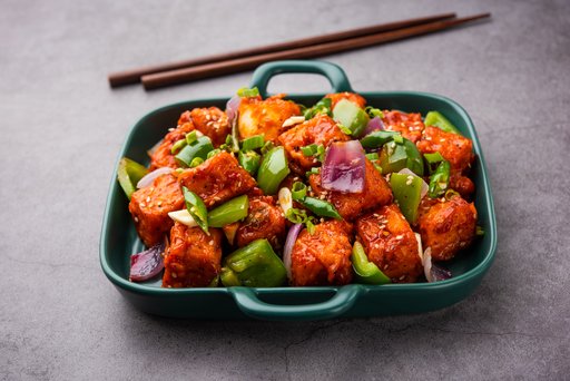 chilli paneer dry is made using cottage cheese, Indo chinese food
